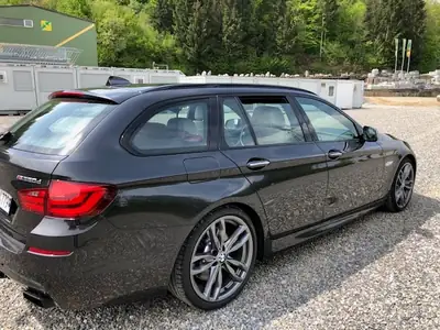BMW M550d xDrive Touring — Break diesel performant, 381 ch, transmission intégrale — vue extérieure