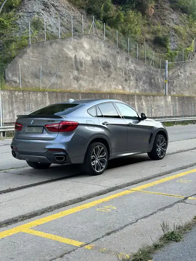 BMW X6 xDrive 40d M Sport Plus — Coupé SUV premium diesel, 107'000 km — côté