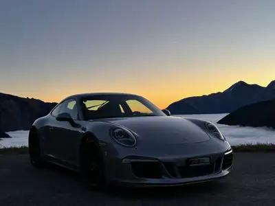 Porsche 911 Carrera 4S PDK — Propulsion intégrale, 400 ch et transmission sport — side view