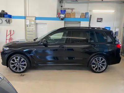 BMW X7 xDrive M50i — SUV premium 7 places, 530 ch et faible kilométrage — Heckansicht