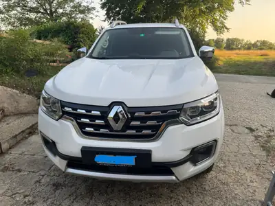 Renault Alaskan Doppel Cabine Twin Turbo dCi 190 4WD — Pickup robuste, 150'000 km, sans sinistre — interni