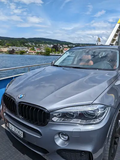 BMW X5 xDrive 50i Pure M Sport Plus — SUV premium 7 places, 450 ch, 72 000 km — côté