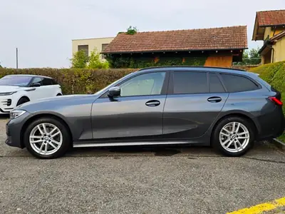 BMW 320d xDrive Touring — Break diesel hybride 48V, 190 ch et traction intégrale — rear view