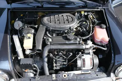 MINI Cooper 1.3i — Classique urbain des années 2000, toit ouvrant électrique — Miniatura 11