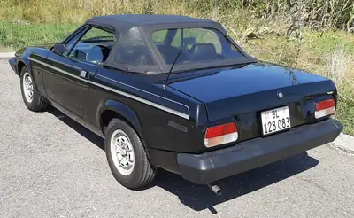 TRIUMPH TR7 1982 — Cabriolet britannique authentique, 64'000 km d'origine — Miniatura 8