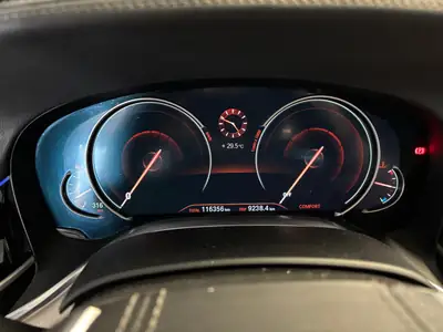 BMW 750d xDrive Steptronic — Berline de prestige diesel, 400 ch et traction intégrale — Seitenansicht