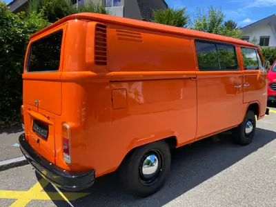 VW T2 1973 Camper — Légende de la route, très bas kilométrage — côté