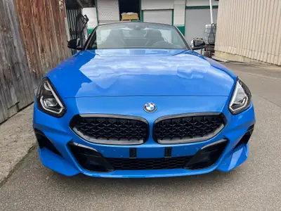 BMW Z4 sDrive 20i Steptronic — Cabriolet sportif, état neuf, 28 000 km seulement — fianco