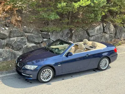 BMW 335i Cabriolet — Roadster sportif 306 ch, expertise du jour — side view