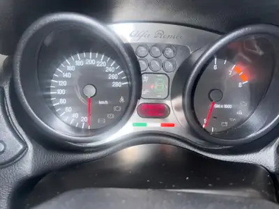 Alfa Romeo Spider Busso 3.2 24V — Cabriolet de légende avec moteur V6 rare — fianco