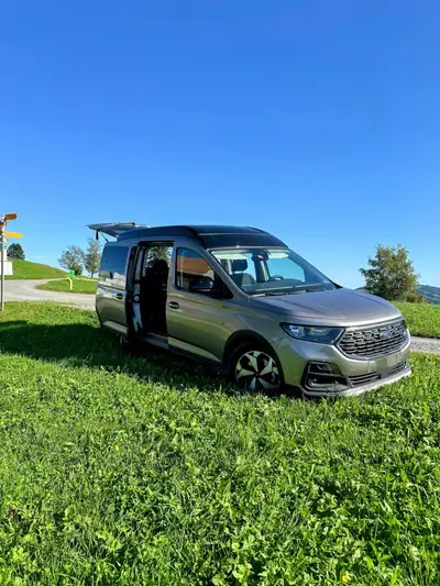 Ford Tourneo Connect Grand 2.0 EcoBlue AWD — 7 places, 4x4, faible kilométrage — côté