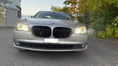 BMW 750i — Berline de prestige 408 ch, révision complète, sans accident — fianco