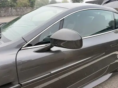 Aston Martin V12 Vanquish — Coupé sport britannique d'exception, 574 ch, 56'000 km — Thumbnail 7