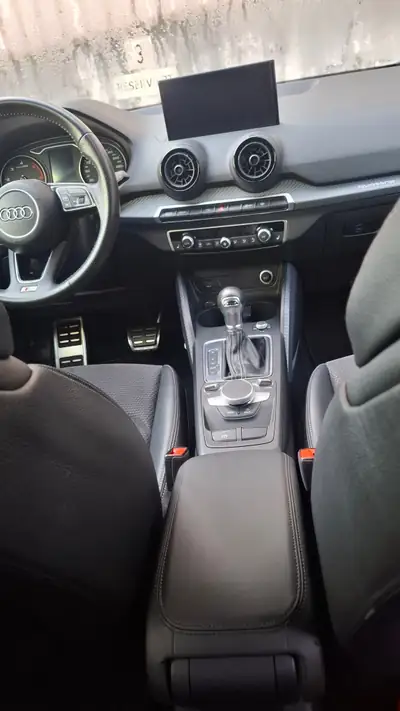 Audi Q2 2.0 TDI Sport Quattro — SUV compact dynamique, quattro intégral et 96'000 km — fianco