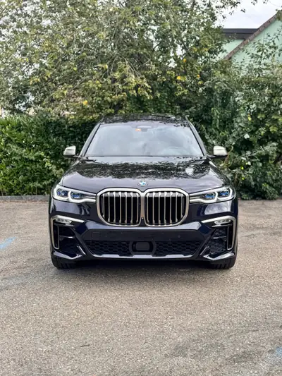 BMW X7 xDrive M50i — SUV 7 places premium, 530 ch et 64 200 km seulement — side view