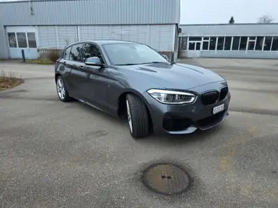 BMW M135i xDrive — Berline sportive 320 ch, équipement M Performance premium — side view