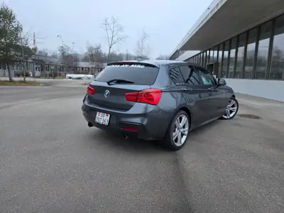 BMW M135i xDrive — Berline sportive 320 ch, équipement M Performance premium — rear view