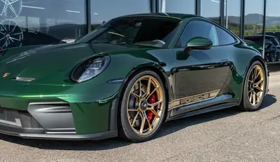Porsche 911 Carrera GT3 PDK Touring 2026 — Performance brute et élégance verte — Thumbnail 13