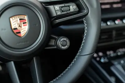 Porsche 911 Carrera GT3 PDK Touring 2026 — Performance brute et élégance verte — Thumbnail 22