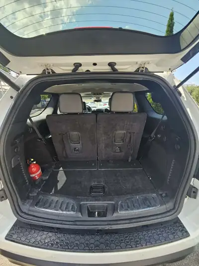 Dodge Durango 2014 — Imposant SUV 7 places tout-terrain, kilométrage maîtrisé — Miniatura 9