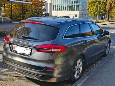 Ford Mondeo Titanium Hybride 2020 — Break spacieux, motorisation écologique et tachygraphe intégré — fianco
