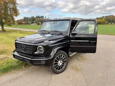 Mercedes-Benz G 500 AMG Line — SUV légendaire, première main, entretien complet — side view