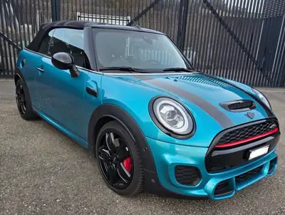 MINI Cabrio Cooper John Cooper Works — Cabriolet sportif 231 ch, vert métallisé, freinage de service optimal — vista esterna