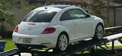 VW Beetle 1.8 TSI 170 PS — Coupé emblématique, essence performante, très faible kilométrage — arrière