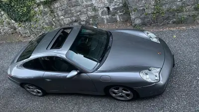 Porsche 911 Carrera 4S 2002 — Coupé sportif légendaire, 89'000 km seulement — côté