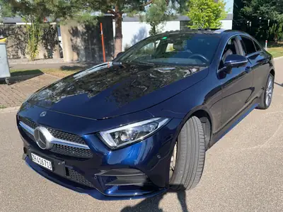 Mercedes-Benz CLS 450 4Matic AMG Line — Coupé élégant, moteur hybride performant — vista posteriore