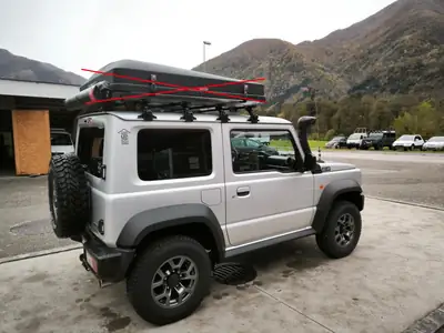 Suzuki Jimny 1.5 Compact Top 4x4 — Le vrai 4x4 urbain, 28'000 km seulement — côté