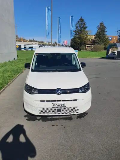 VW Caddy 2.0 TDI DSG — Utilitaire polyvalent, faible kilométrage, boîte automatique — side view