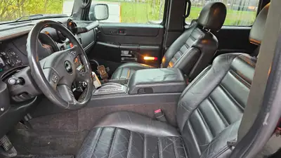 HUMMER H2 SUT — Le pickup muscle américain au design emblématique — fianco