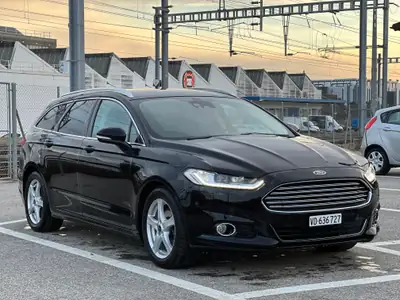 Ford Mondeo 2.0 TDCi Titanium AWD — Monospace familial robuste, transmission automatique PowerShift — Heckansicht