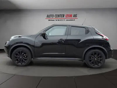 Nissan Juke 1.6 DIG-T Tekna 4x4 — SUV dynamique, transmission CVT, caméra & navigation — rear view