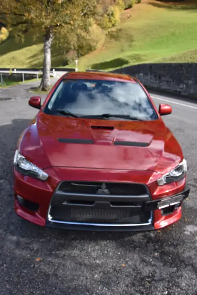 Mitsubishi Lancer Evo X GSR TC-SST — Légende sportive, 36'000 km, son Rockford Fosgate — intérieur