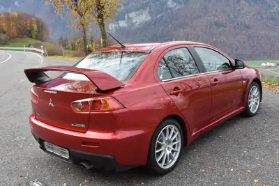 Mitsubishi Lancer Evo X GSR TC-SST — Légende sportive, 36'000 km, son Rockford Fosgate — Miniature 7