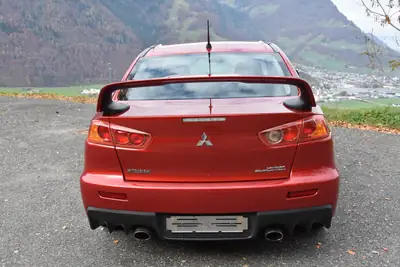 Mitsubishi Lancer Evo X GSR TC-SST — Légende sportive, 36'000 km, son Rockford Fosgate — Miniature 8