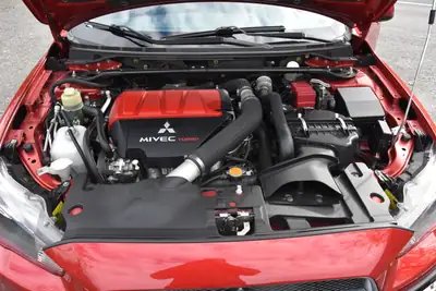 Mitsubishi Lancer Evo X GSR TC-SST — Légende sportive, 36'000 km, son Rockford Fosgate — Miniature 11
