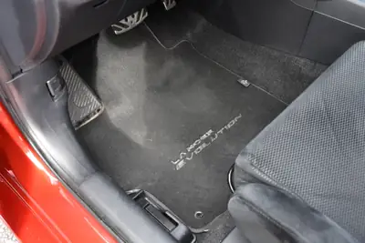 Mitsubishi Lancer Evo X GSR TC-SST — Légende sportive, 36'000 km, son Rockford Fosgate — Miniature 12