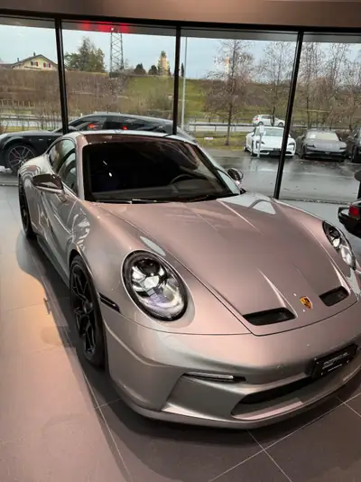 Porsche 911 GT3 2023 — Sportive pure avec Touring-Paket, 5700 km seulement — side view