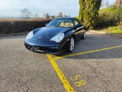 Porsche 911 Carrera 4 2003 — Coupé légendaire, transmission automatique, 144'687 km — côté