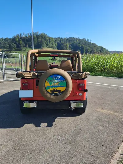 Jeep Wrangler Rio Grande 2.5L — Légende 4×4 des années 90, 83'000 km seulement — vista posteriore