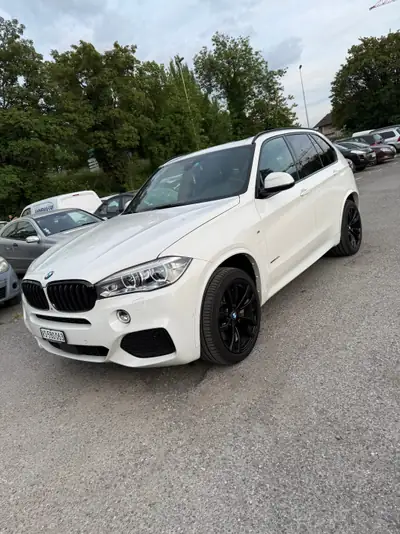 BMW X5 xDrive 50i M Steptronic — SUV 7 places premium, 450 ch et traction intégrale — Außenansicht