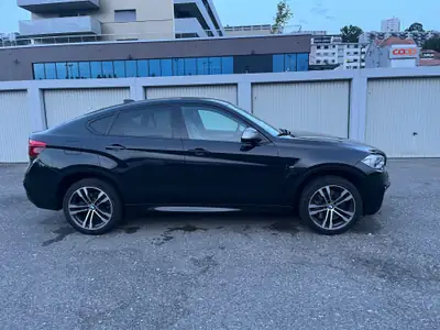 BMW X6 M50d Steptronic — SUV coupé diesel 381 ch, historique sans sinistre — Heckansicht