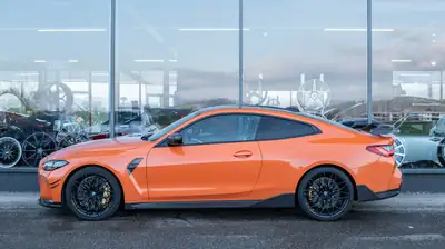 BMW M4 Coupé Competition — 510 ch, Orange métallisé, garantie 12 mois — exterior view