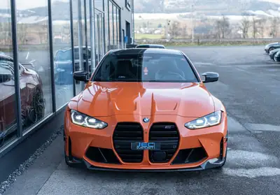 BMW M4 Coupé Competition — 510 ch, Orange métallisé, garantie 12 mois — rear view