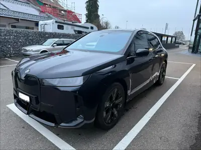 BMW iX xDrive60 M Sport Pro — SUV électrique haute performance, quasi neuf — dashboard