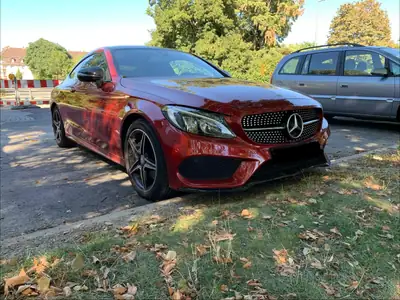 Mercedes-Benz C 180 AMG Line Coupé — Élégance sportive et consommation maîtrisée — côté
