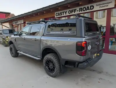 Ford Ranger Wildtrak 2.0 Eco Blue e-4WD — Pickup premium préparé ARB, 9000 km seulement — côté